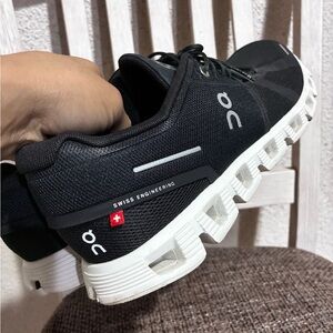 On Running Black and White Athletic Shoes with CloudTec Sole